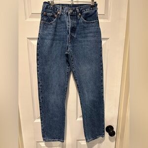 Levi’s 501 Button-fly, high rise, straight leg. 26x28 women’s, classic med wash